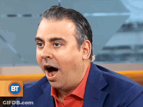 A Man With A Surprised Look On His Face And A Bt Logo Behind Him GIF