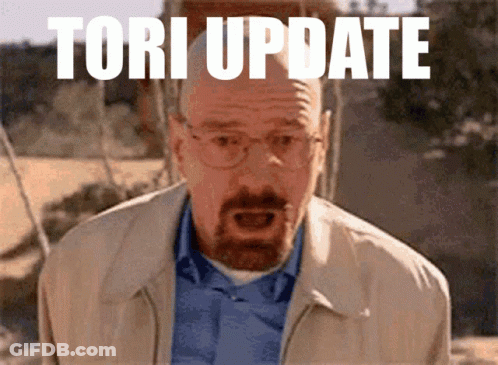 A Man With A Surprised Look On His Face And The Words " Tori Update " Behind Him GIF