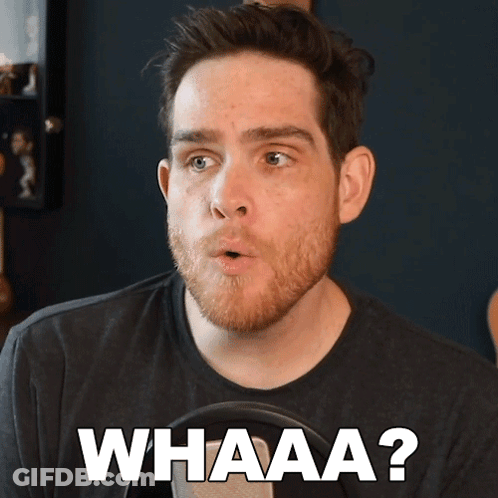 A Man With A Surprised Look On His Face And The Words Whaaa Written Below Him GIF