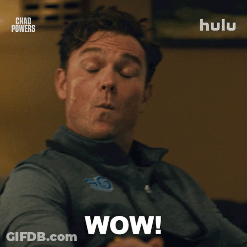 A Man With A Surprised Look On His Face And The Words Wow On The Bottom GIF