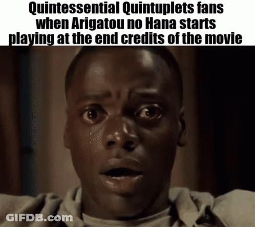 A Man With A Surprised Look On His Face Is Playing At The End Credits Of The Movie Quintessential Quintuplets . GIF