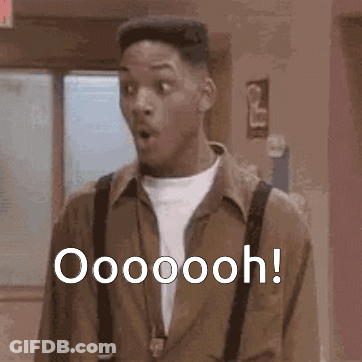 A Man With A Surprised Look On His Face Is Standing In A Hallway And Says Oooooooh ! GIF