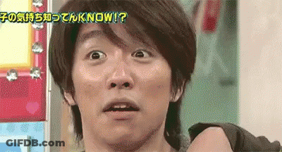 A Man With A Surprised Look On His Face Is Standing In Front Of A Sign That Says `` Know ? '' GIF