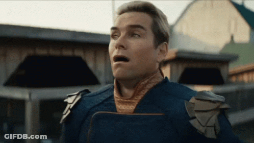 A Man With A Surprised Look On His Face Is Wearing A Blue Uniform GIF