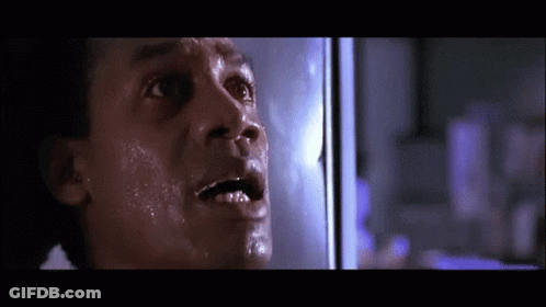 A Man With A Surprised Look On His Face GIF