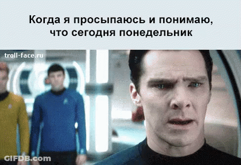 A Man With A Surprised Look On His Face Stands In Front Of A Group Of People GIF