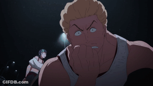 A Man With A Surprised Look On His Face Stands Next To A Girl GIF