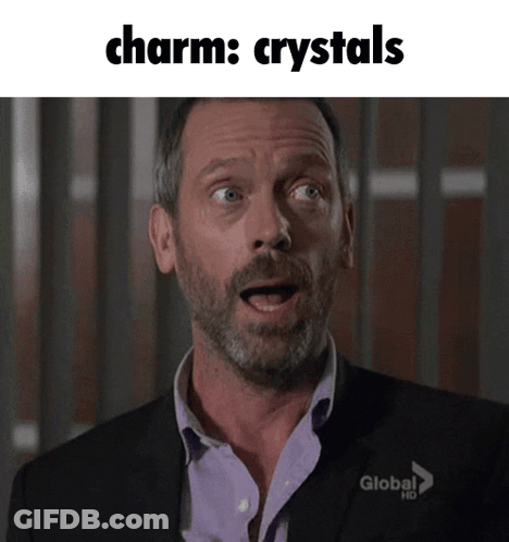 A Man With A Surprised Look On His Face With The Words Charm Crystals Below Him GIF