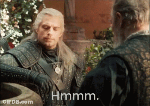 A Man With A Sword Is Standing Next To Another Man With The Word Hmm Written Below Him GIF