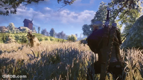 A Man With A Sword Standing In A Field GIF