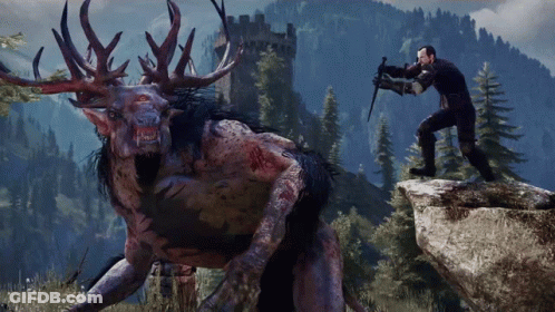 A Man With A Sword Standing Next To A Monster GIF