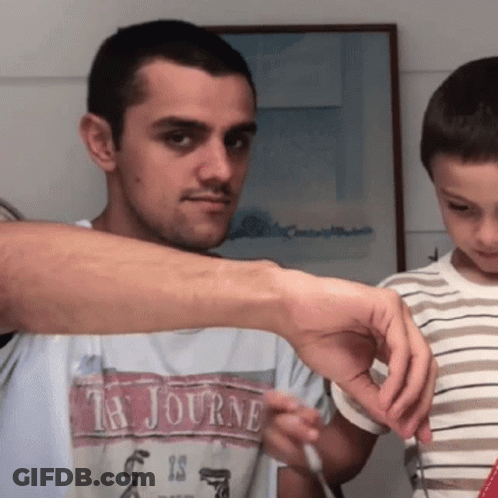 A Man With A Ta Journe Shirt On GIF