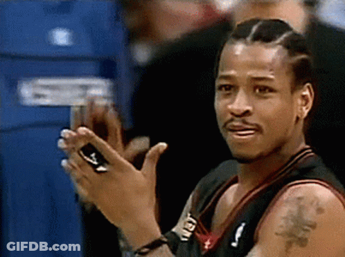 A Man With A Tattoo On His Arm Is Clapping GIF