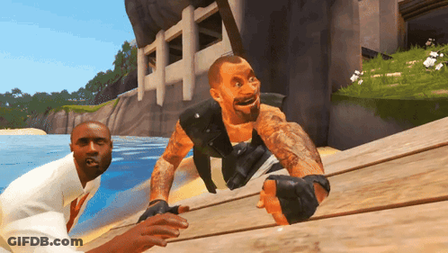 A Man With A Tattoo On His Arm Is Crawling On A Wooden Surface GIF