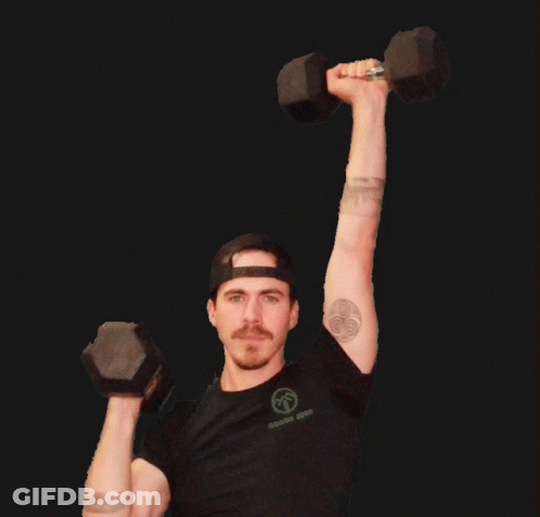 A Man With A Tattoo On His Arm Is Lifting Two Dumbbells Over His Head GIF