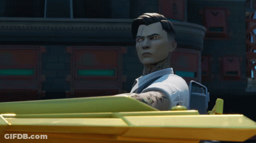 A Man With A Tattoo On His Arm Is Sitting In A Yellow Car GIF