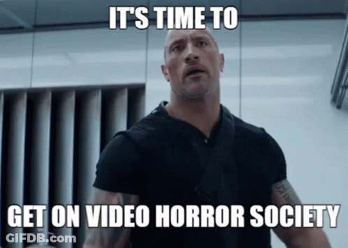 A Man With A Tattoo On His Arm Says It 'S Time To Get On Video Horror Society .. GIF