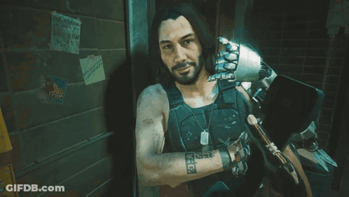 A Man With A Tattoo On His Arm That Says X-E-E GIF