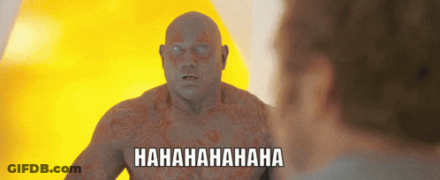 A Man With A Tattoo On His Chest Is Laughing While Looking At Another Man With The Words Hahahaha Written Below Him GIF