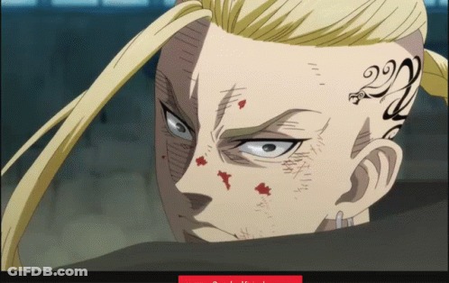 A Man With A Tattoo On His Face Has The Number 22 On His Forehead GIF