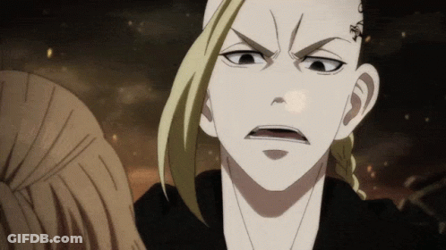 A Man With A Tattoo On His Forehead Is Making A Very Angry Face GIF