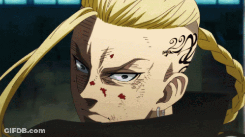 A Man With A Tattoo On His Forehead With The Number 22 GIF