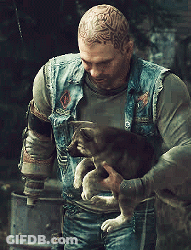 A Man With A Tattoo On His Head Is Holding A Dog GIF