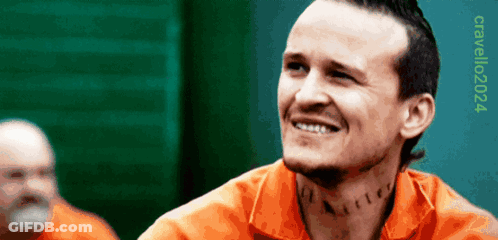 A Man With A Tattoo On His Neck Is Smiling With The Year 2024 On The Bottom GIF