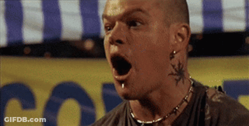 A Man With A Tattoo On His Neck Is Standing In Front Of A Sign That Says Police GIF