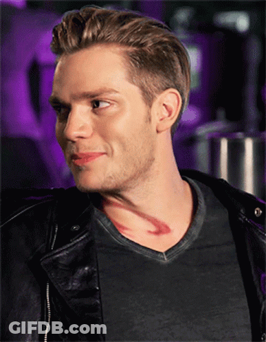 A Man With A Tattoo On His Neck Is Wearing A Black Jacket GIF