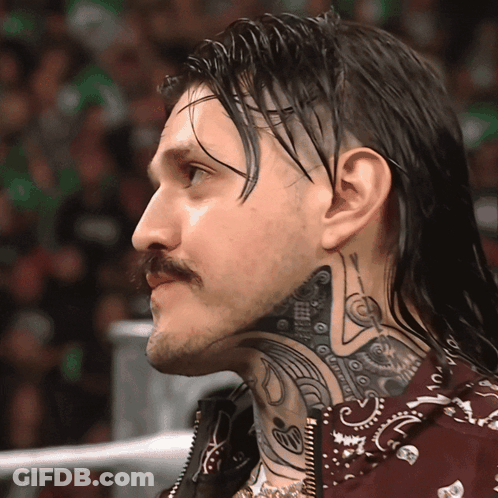 A Man With A Tattoo On His Neck Is Wearing A Red Shirt GIF