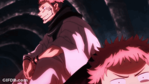 A Man With A Tiger On His Face Sits Next To Another Man With A Surprised Look On His Face GIF