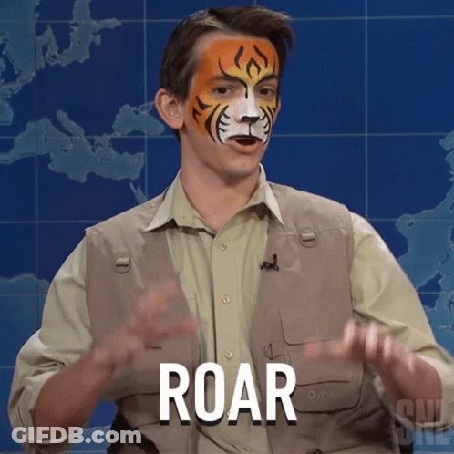 A Man With A Tiger Painted On His Face Has The Word Roar In Front Of Him GIF