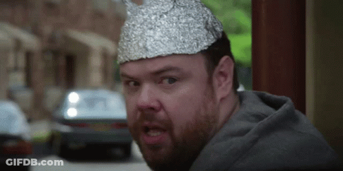 A Man With A Tin Foil Hat On His Head GIF