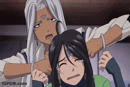 A Man With A Triangle On His Face Is Holding A Woman 'S Head GIF