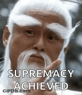 A Man With A White Beard And Mustache Is Giving A Thumbs Up Sign . GIF