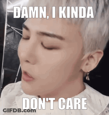A Man With A White Shirt And Earrings Says Damn I Kinda Don 'T Care GIF