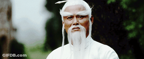 A Man With A White Wig And Beard Looks Serious GIF