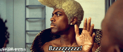 A Man With A Wig On Says Bzzzzzzz GIF