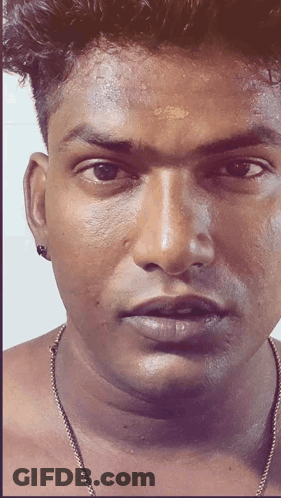 A Man With A Yellow Dot On His Forehead GIF