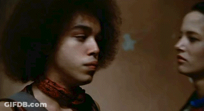 A Man With An Afro Says Hey Little Man You Want To Music . GIF