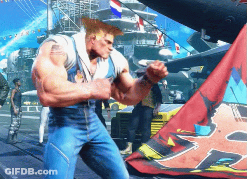 A Man With An American Flag On His Chest Is Standing In Front Of A Flag With The Letter P On It GIF