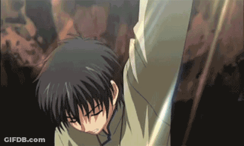 Man With Black Hair Holding Sword In Dark Room GIF