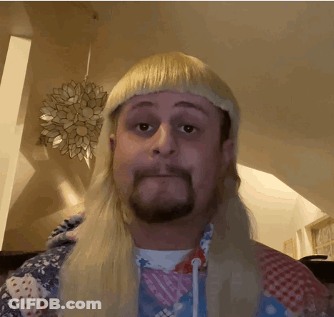 A Man With Blonde Hair And A Beard Is Wearing A Mullet GIF