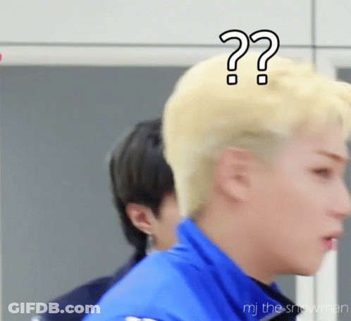A Man With Blonde Hair Has Two Question Marks On His Head GIF
