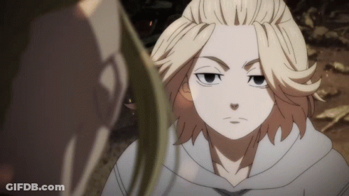 A Man With Blonde Hair Is Looking At Another Man In A White Hoodie GIF