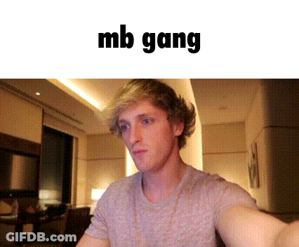 A Man With Blonde Hair Is Sitting In A Room With The Words Mb Gang Above Him GIF