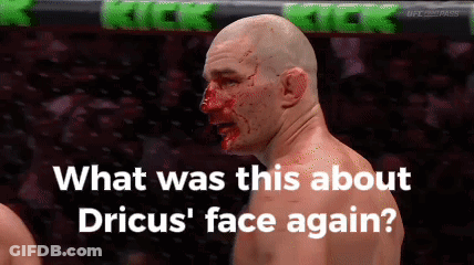 A Man With Blood On His Face And The Words " What Was This About Drius ' Face Again " GIF