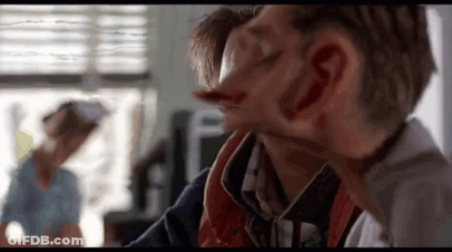 Man With Blood Attacked By Woman GIF
