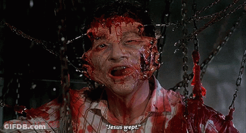 A Man With Blood On His Face Is Chained To Chains And Says Jesus Wept GIF